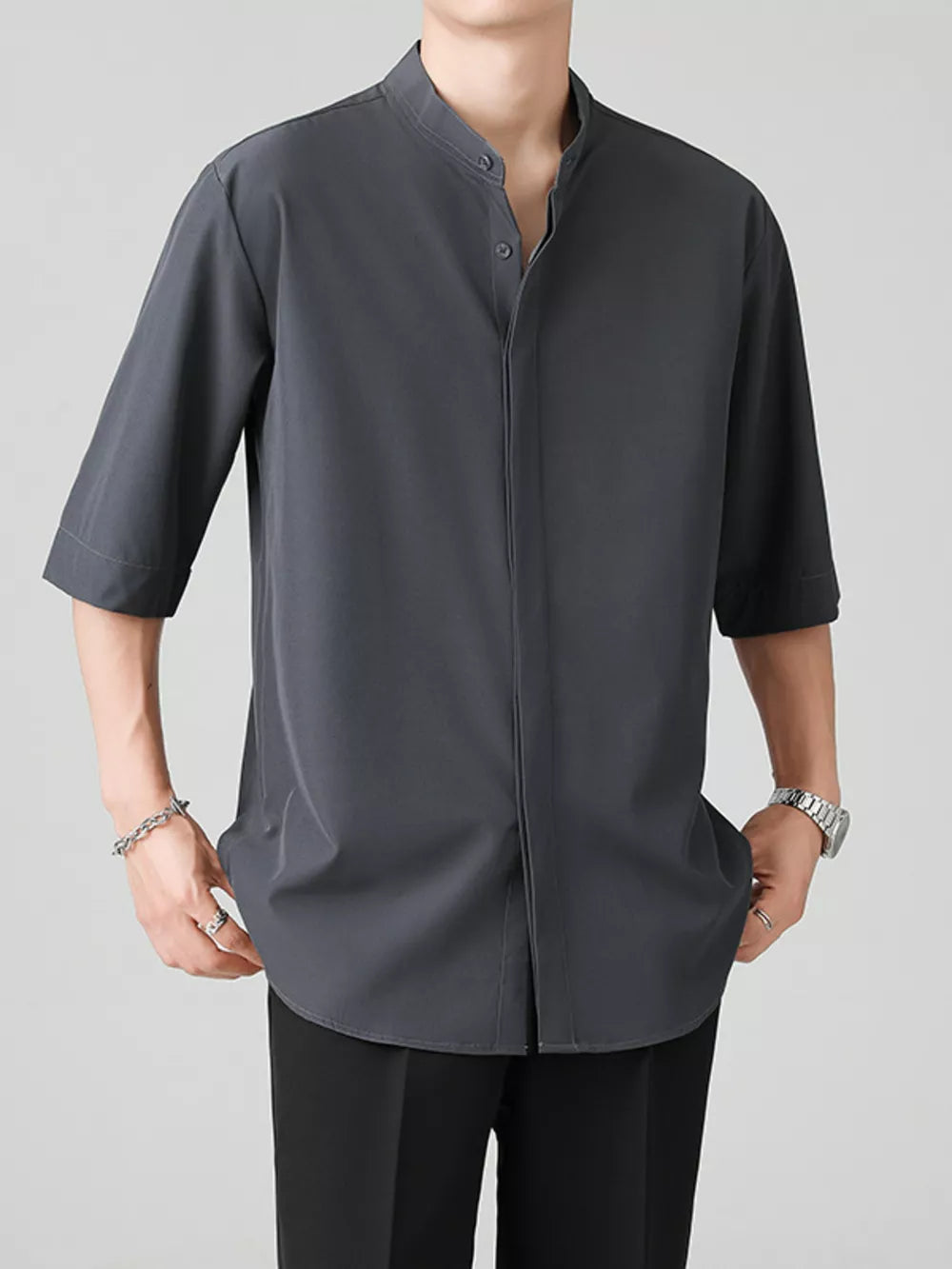 Dark gray oversized Mandarin collar overshirt with half sleeves and button-down front.