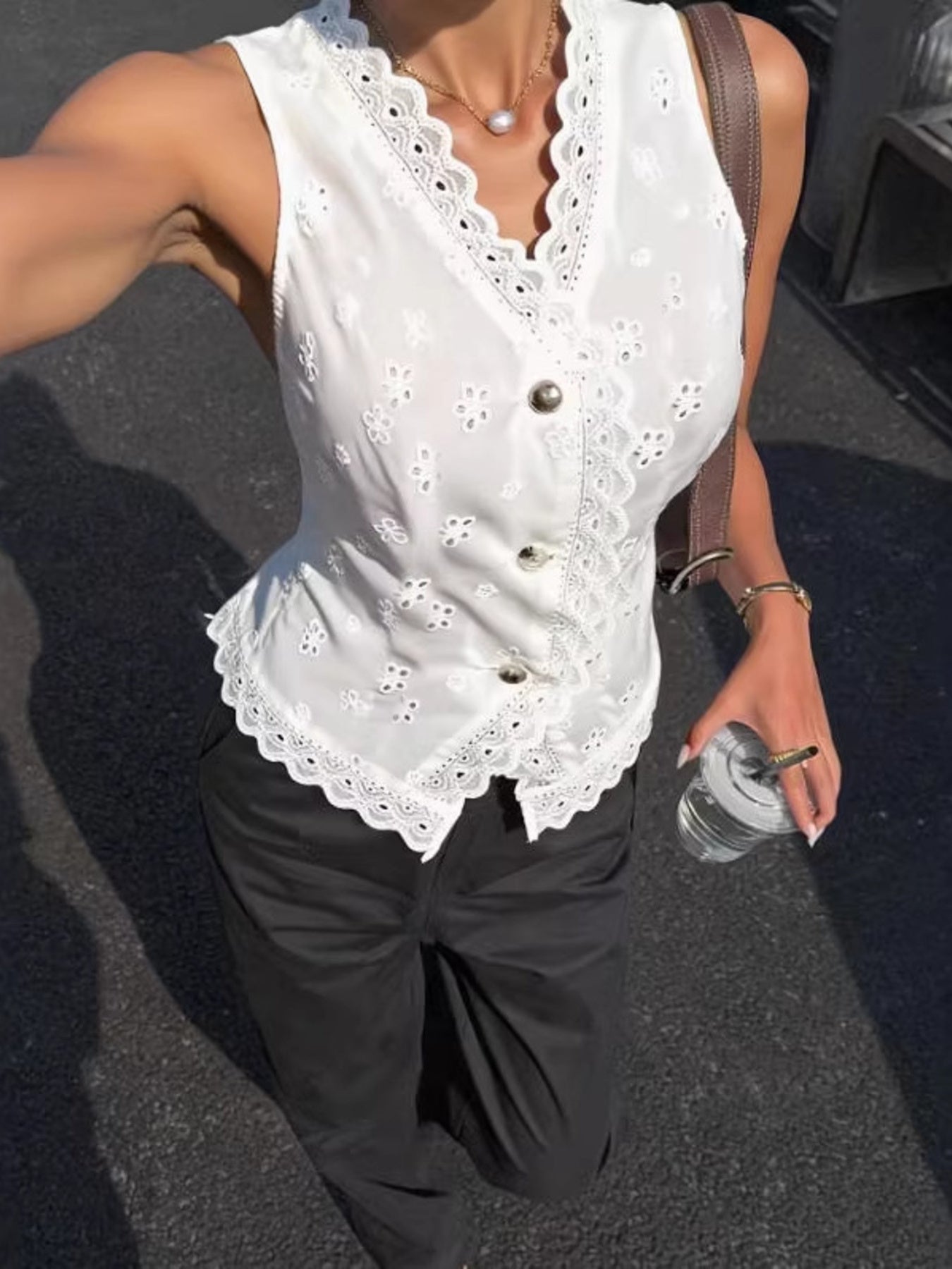 100% polyester Care instructions: Machine wash cold tank top in white with regular silhouette