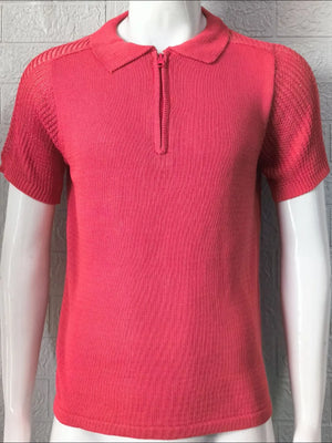 Textured knit polo shirt in strawberry with zip neck and short sleeves.