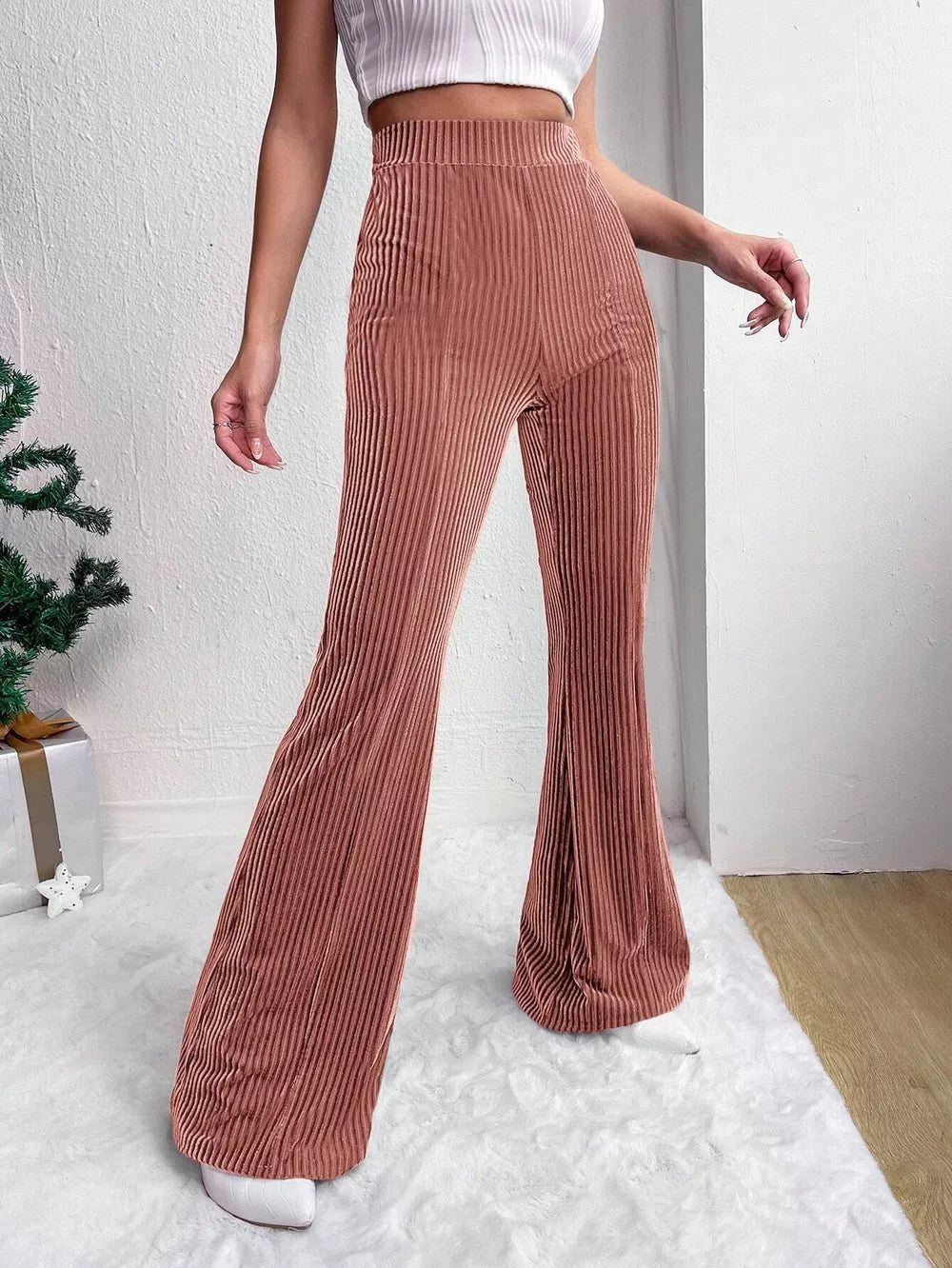 Dusty pink corduroy maternity flare pants with high waist and bell bottoms