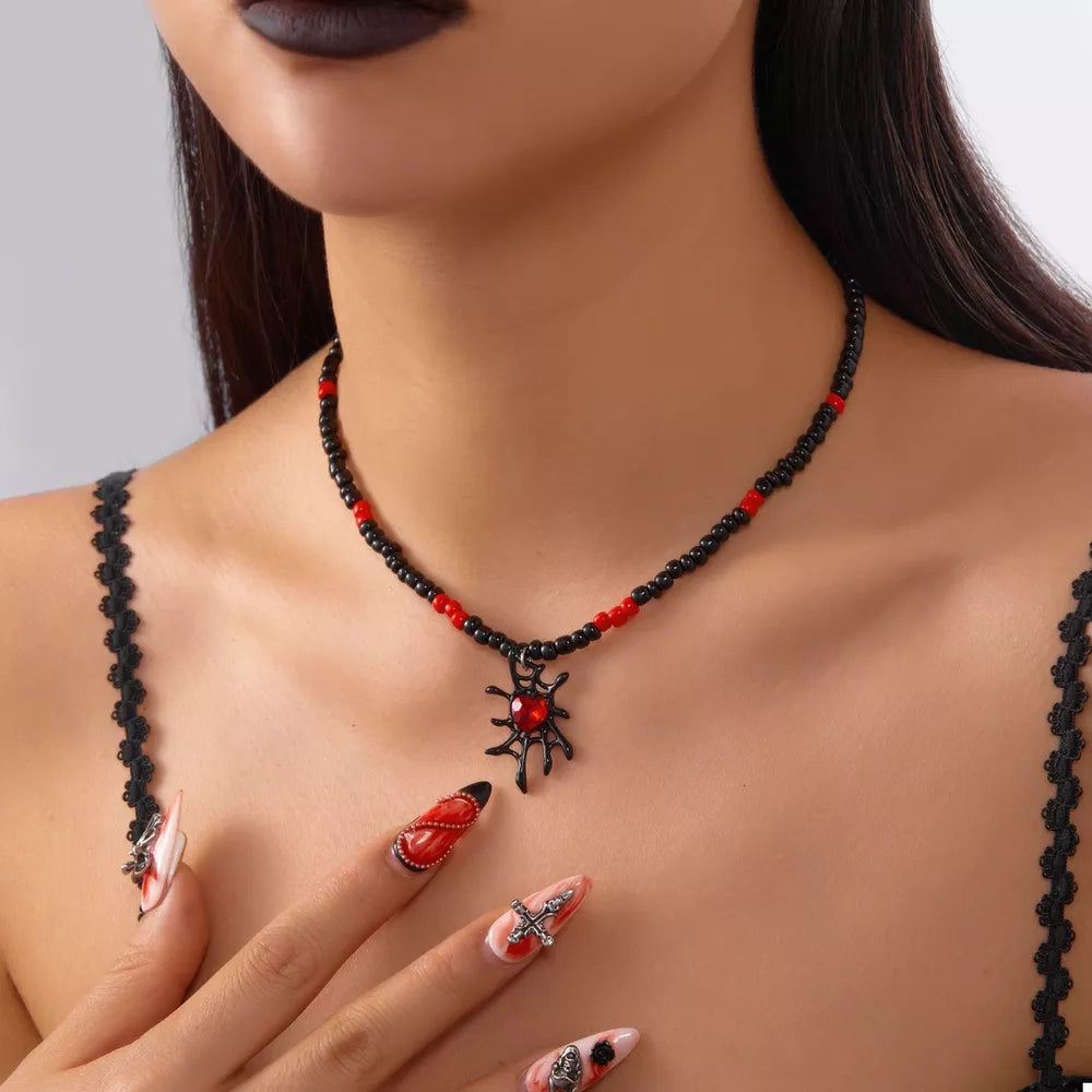 black necklace with spider web and not applicable