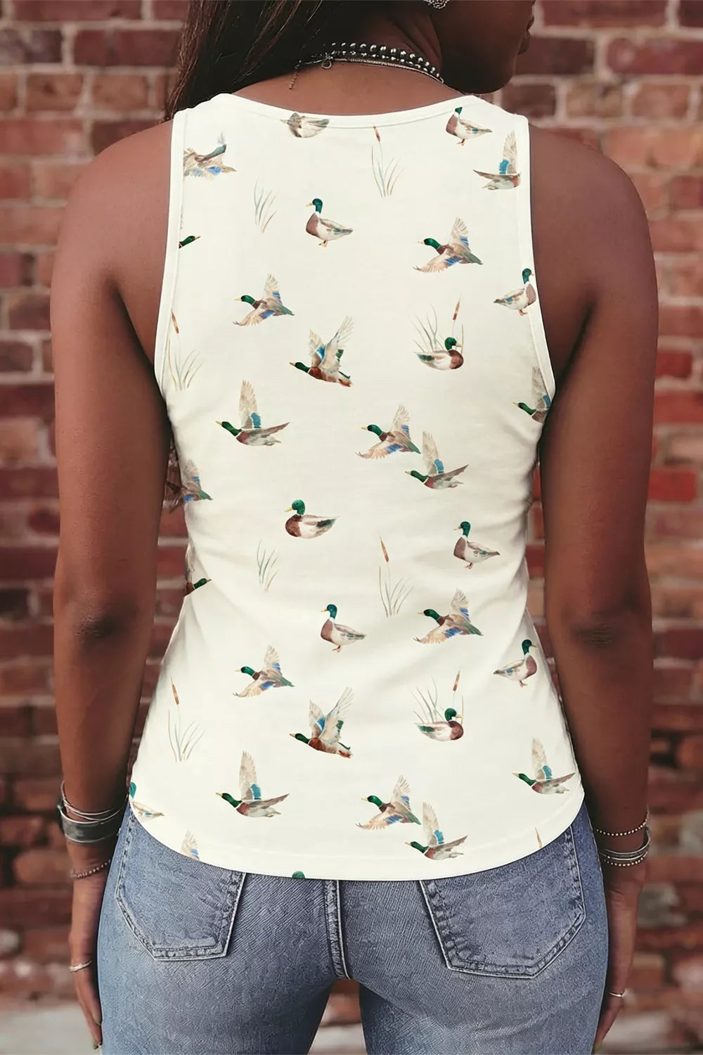 Cream mallard print tank top with cattail accents, round neck, sleeveless.