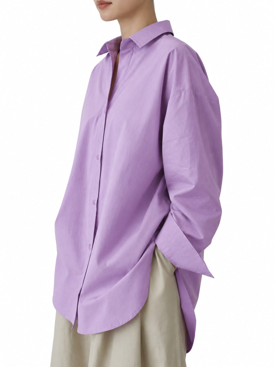 Pink button-down shirt with tunic-length and button-front
