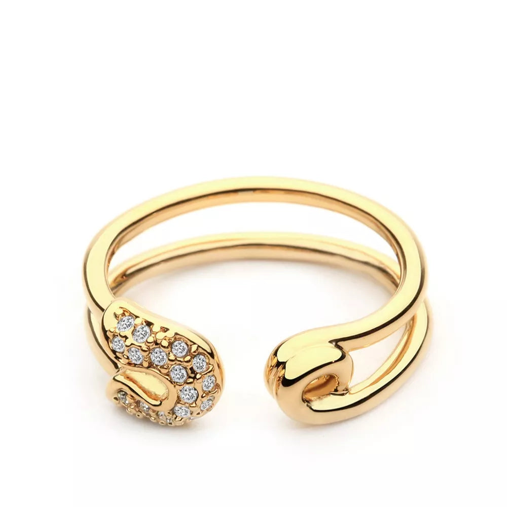 Gold double band ring with zircon embellishments on safety pin detail