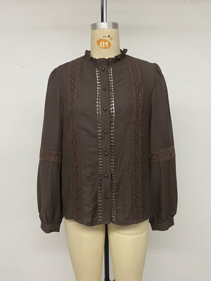 dark brown blouse with button-front and eyelet