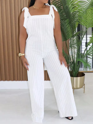 White pinstripe wide-leg romper with tie straps and a square neckline.