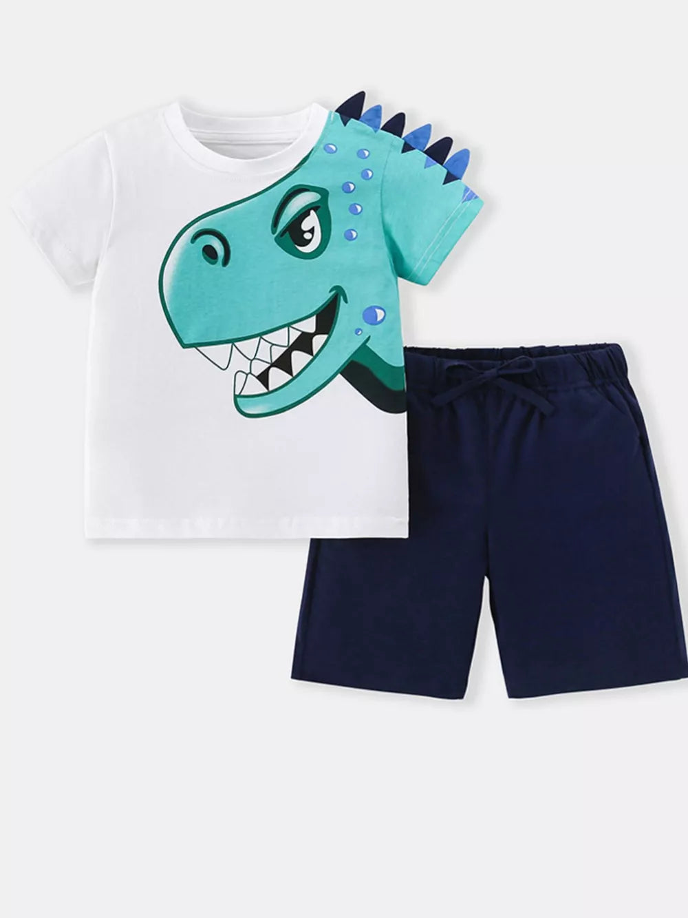 Boys white t-shirt with turquoise dinosaur graphic and navy blue drawstring shorts.