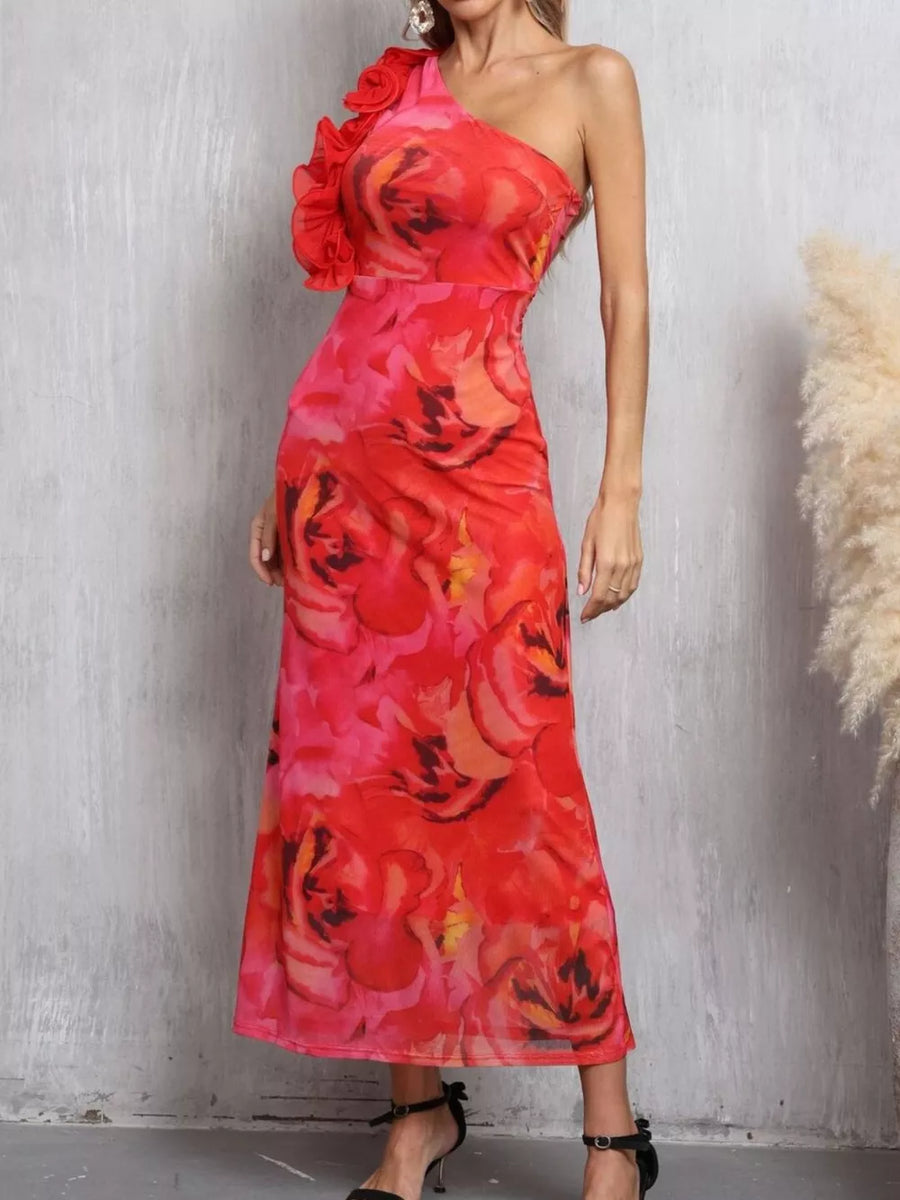 Floral one shoulder maxi dress with ruffled detail and vibrant rose print.