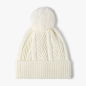 Cream chevron knit beanie with pom and cable details