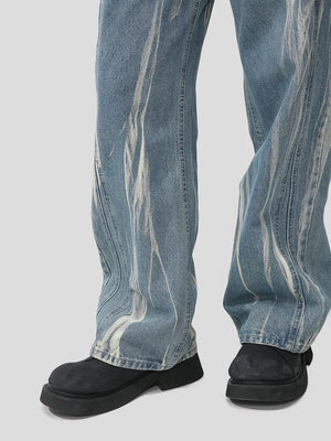 Bleached wash wide leg denim jeans with a distressed pattern and casual fit.