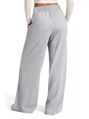 Light gray wide-leg lounge pants with drawstring waist and pockets