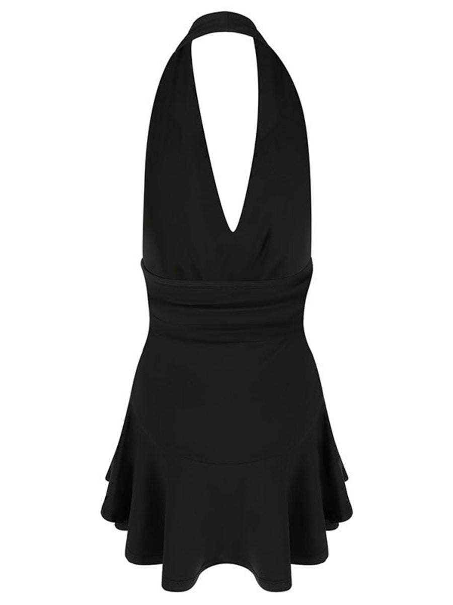 Black halter dress with plunging V-neck, cinched waist, and ruffle hem