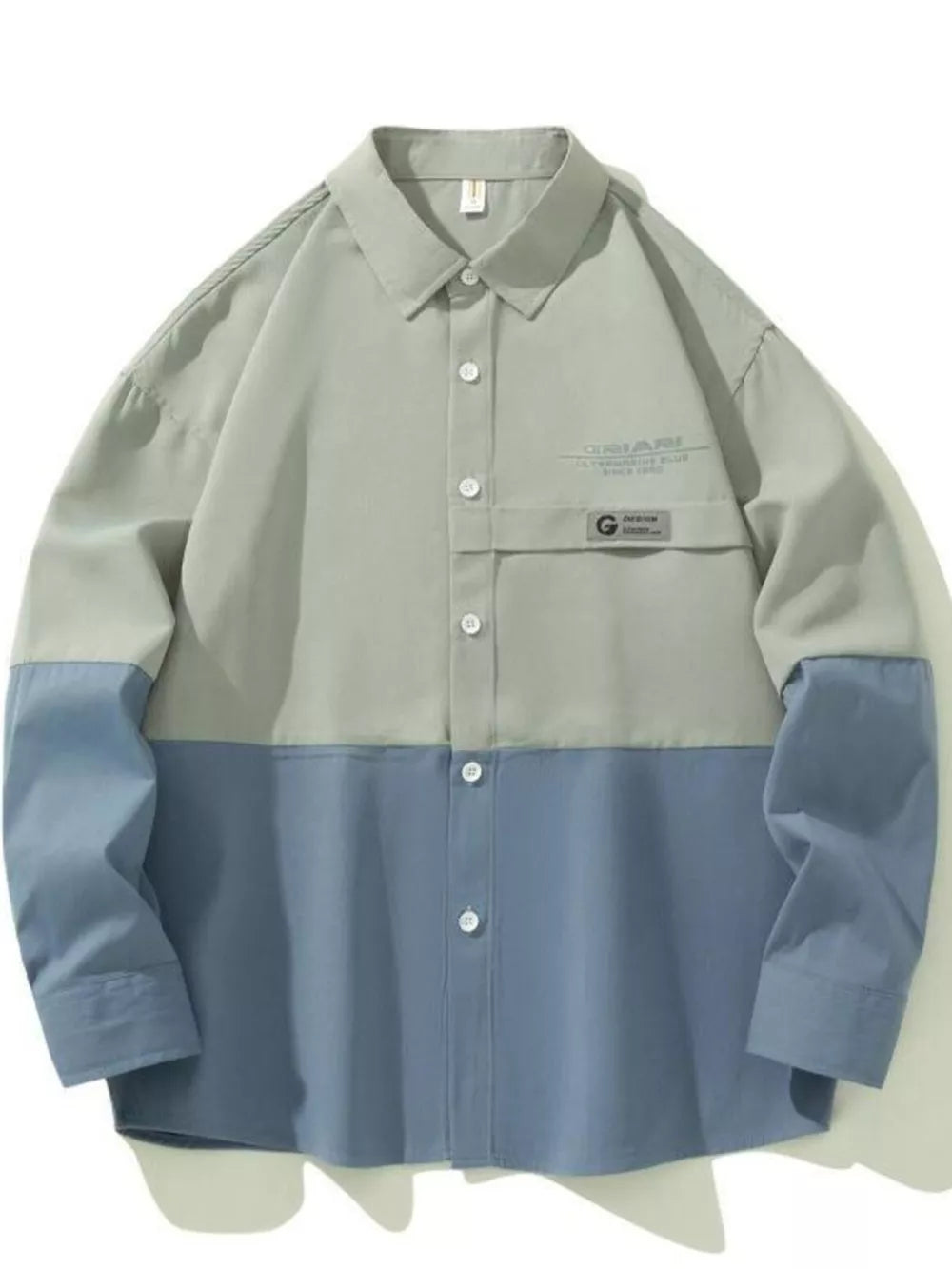Two-tone oversized casual button-down shirt in French Blue and light gray with a chest pocket.