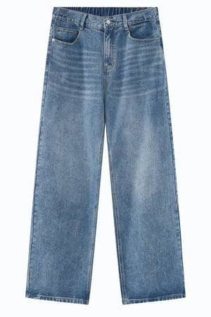 Light blue denim wide-leg trousers with elastic waistband and button fly.