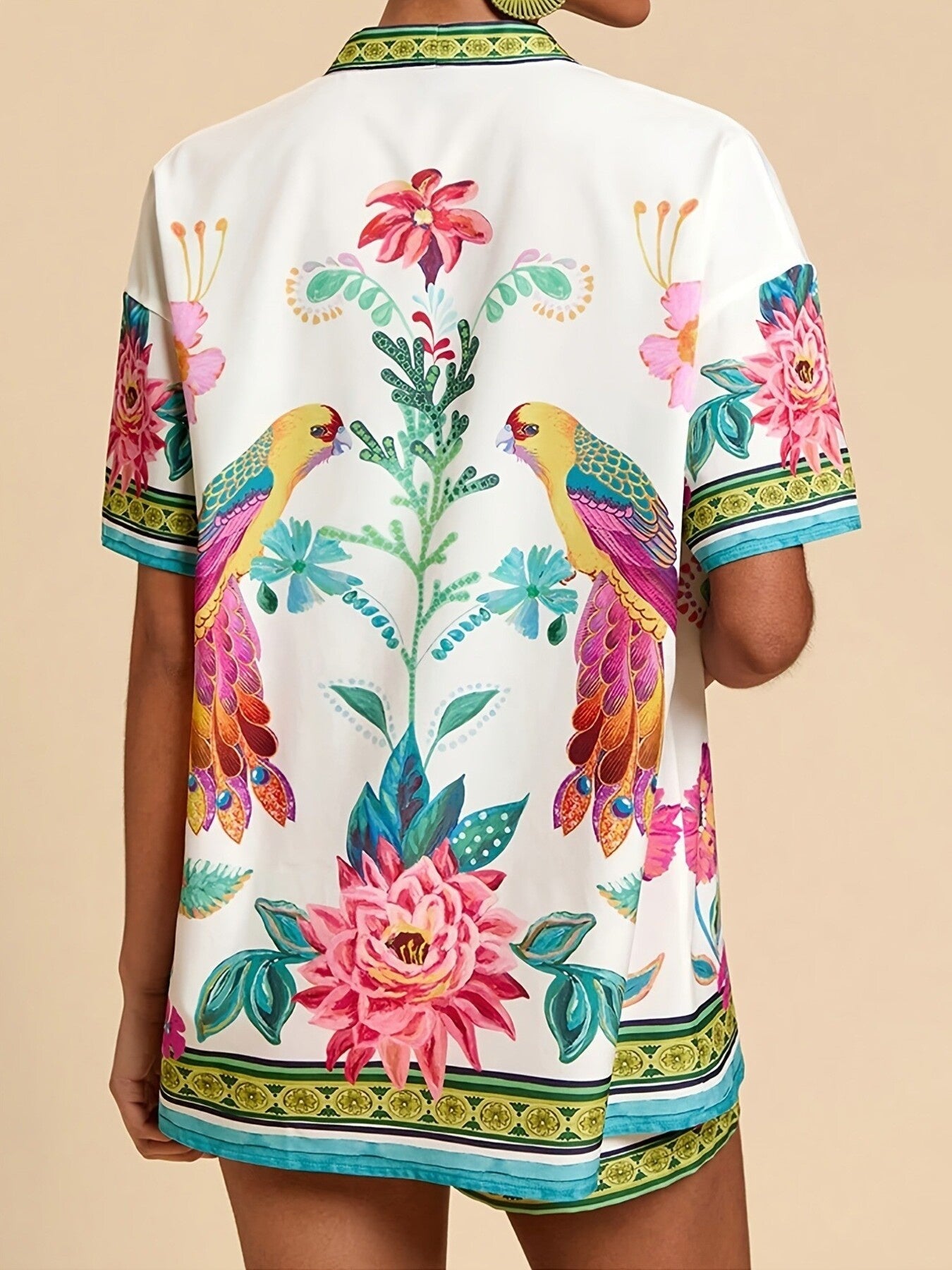White tropical print cardigan with birds and flowers, short sleeves, collared neckline