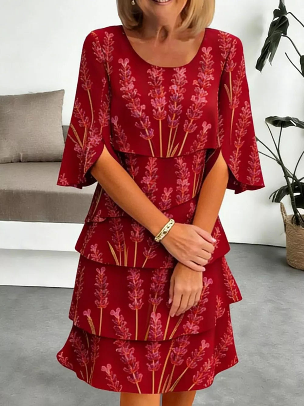 Red floral tiered ruffle hem dress with flutter sleeves and above-knee length.