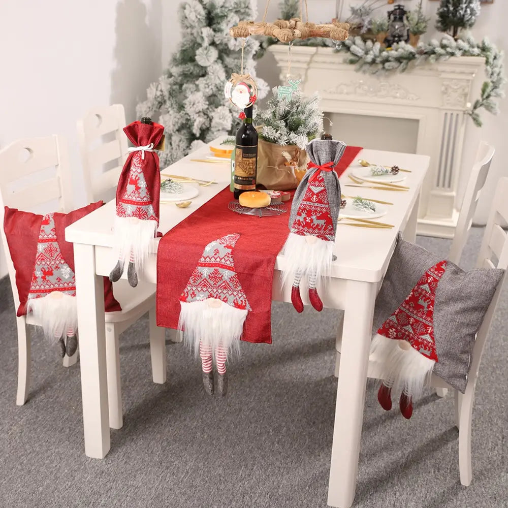 Red table runner and chair accents with charming gnome designs and white beards.