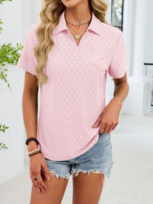 Blush pink eyelet polo collar blouse with short sleeves and a chest pocket.