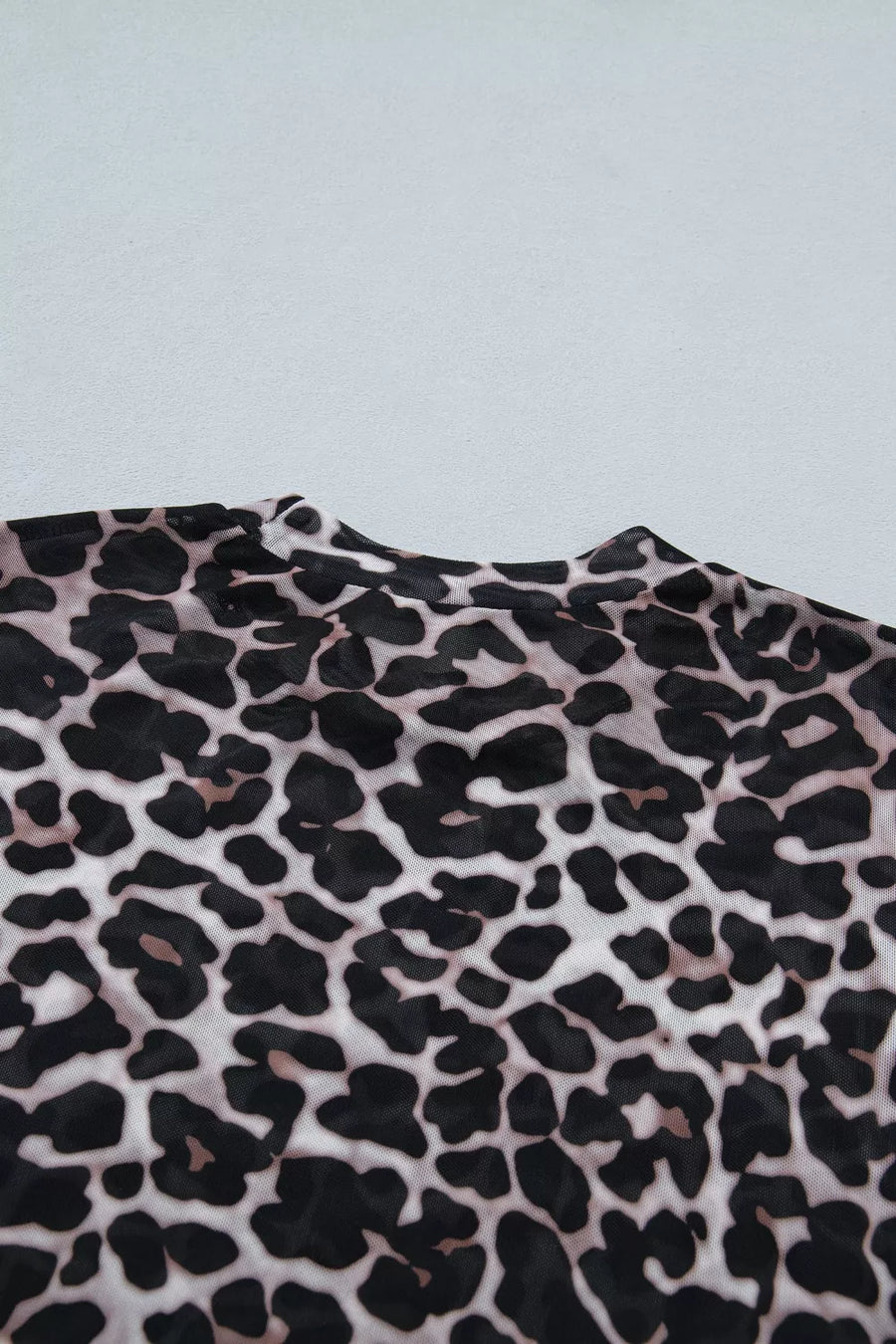 Sheer mesh t-shirt with leopard print and crew neck.