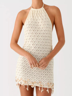 Cream crochet halter mini dress with diamond pattern and shell trim