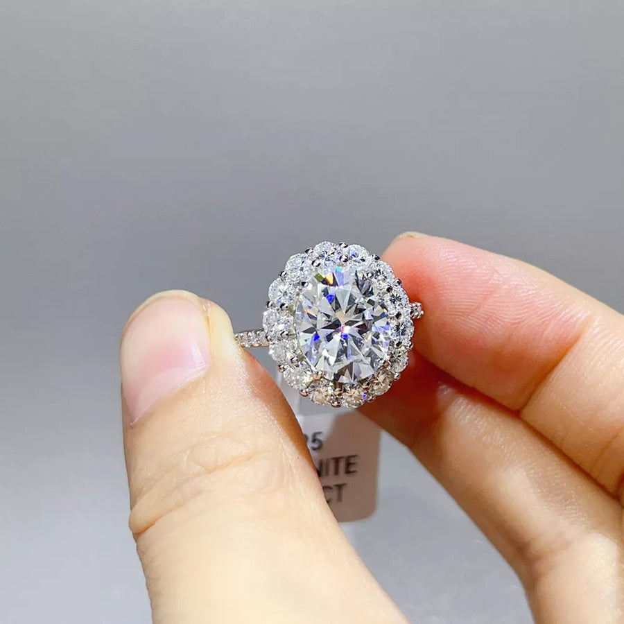925 sterling silver,Moissanite Carat weight: 5ct Care instructions: Avoid wearin ring in clear with oval silhouette