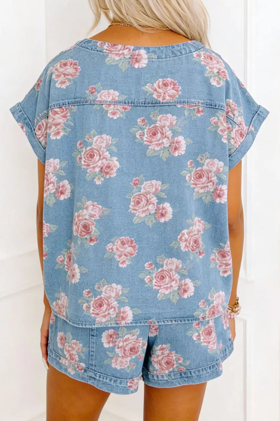 Floral denim two-piece set with boxy top and shorts, featuring pink roses pattern.