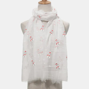 White scarf with festive snowman and snowflake print, frayed hem