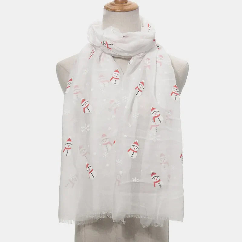 White scarf with festive snowman and snowflake print, frayed hem