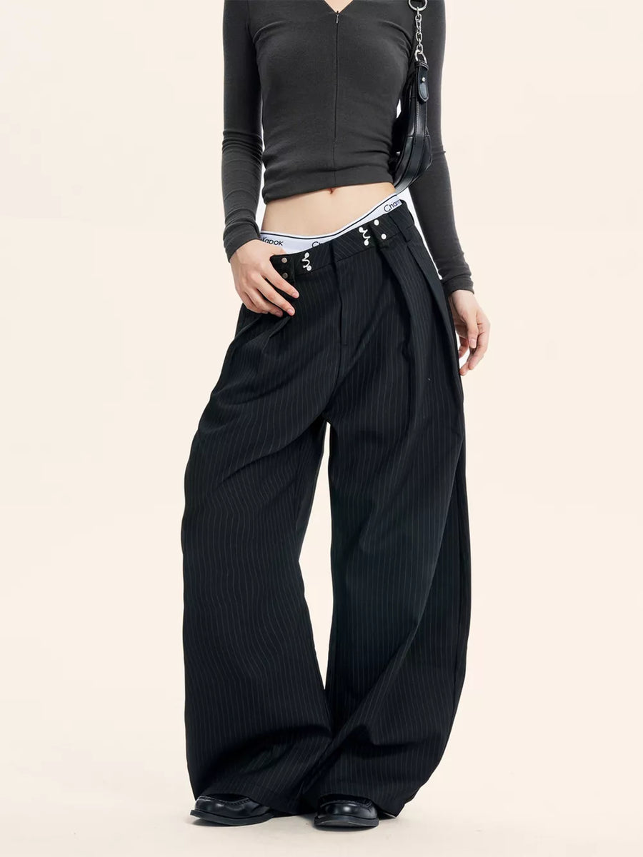 Black wide-leg pants featuring pocketed and striped