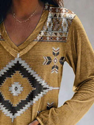 Yellow geometric print V-neck long sleeve t-shirt with tribal pattern detail.