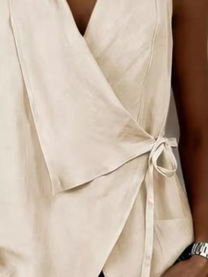 Green wrap top with hip-length and tie