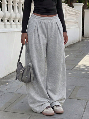 50% viscose, 50% polyester Care instructions: Machine wash cold sweatpants in Black with wide-leg silhouette