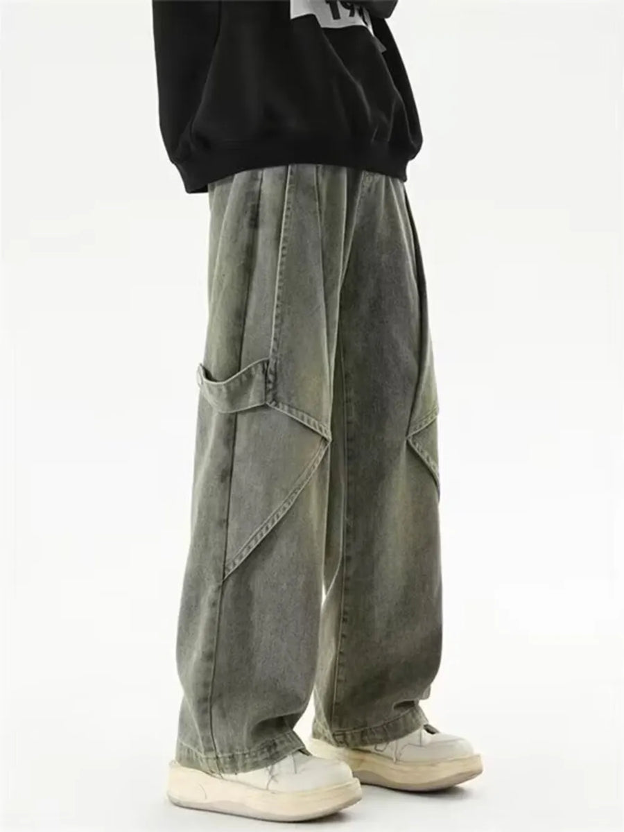 Vintage-inspired wide-leg cargo jeans in washed grey denim with multiple pockets.