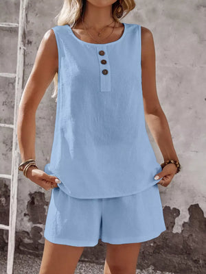 Sky blue cotton two-piece set with decorative buttons on the sleeveless top and matching shorts.