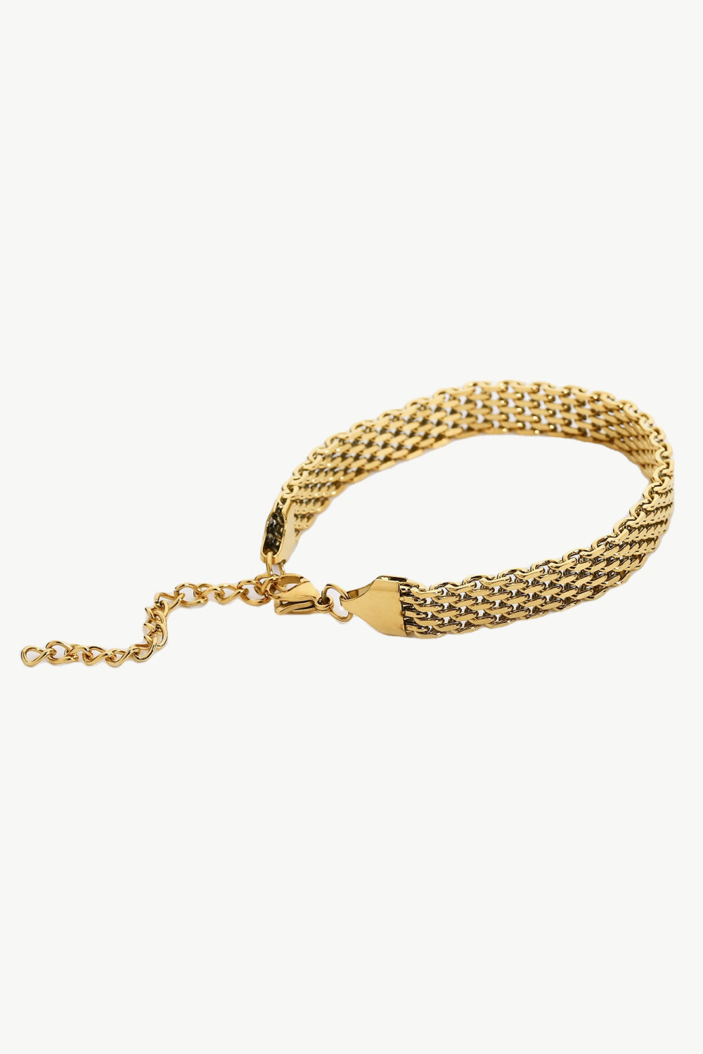 Gold woven chain bracelet with adjustable extender and clasp detail