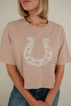 Beige cotton crew neck t-shirt with horseshoe lace and pearl accent detail