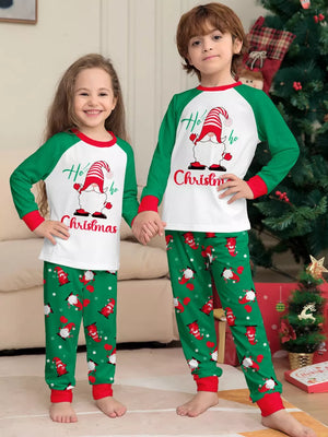 pajama set featuring gnome print in white with 95% polyester, 5% spandex Care instructions: Machine wash cold texture