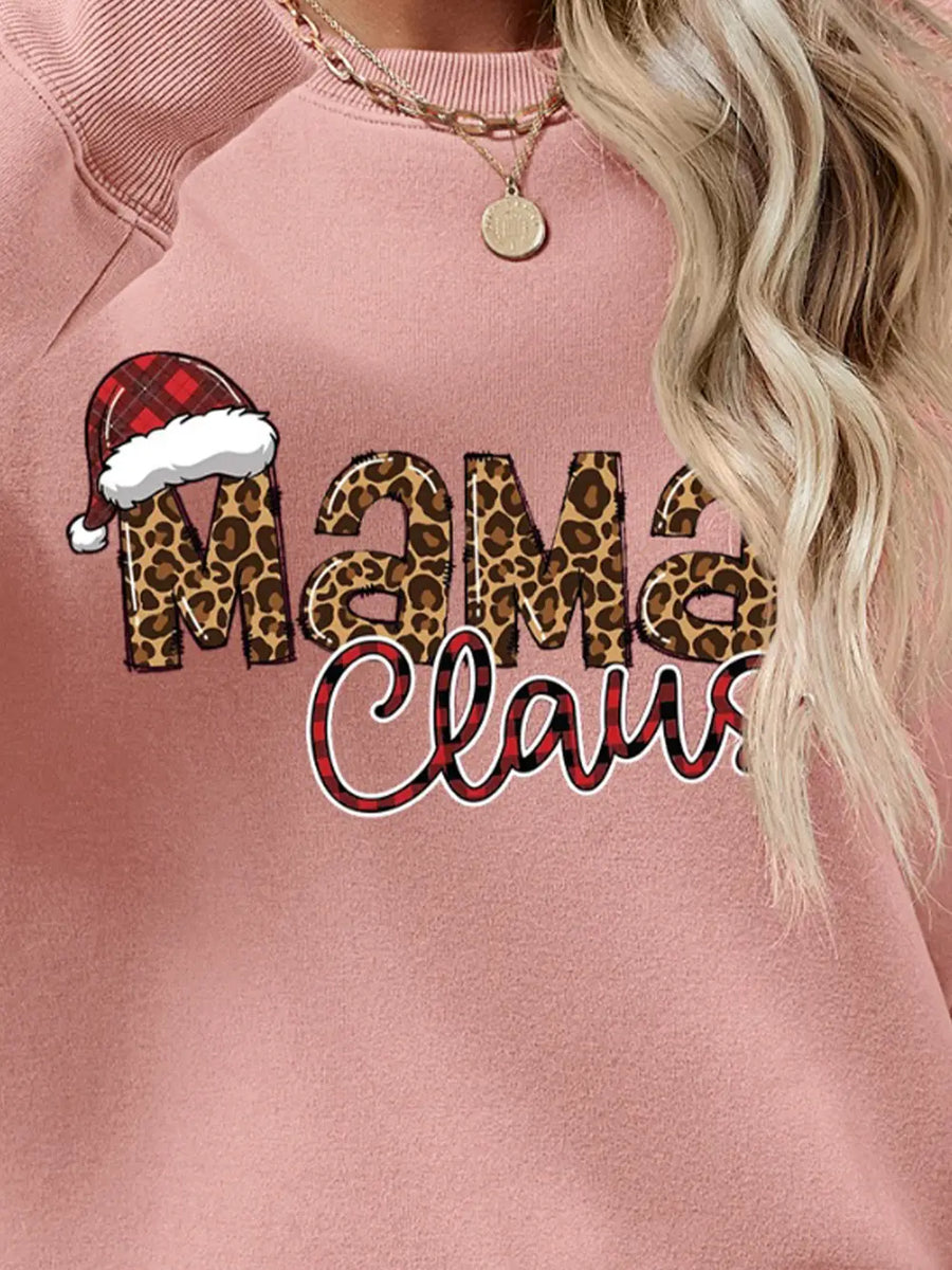 Blush pink crewneck sweatshirt with leopard print "Mama" and plaid "Claus" graphic.