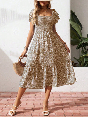 Floral smocked ruffle sleeve midi dress in khaki with a tiered skirt and square neckline.