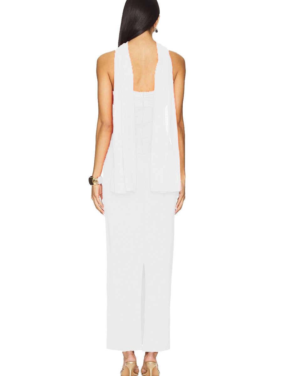 White ruched strapless maxi dress with draped overlay and back slit.
