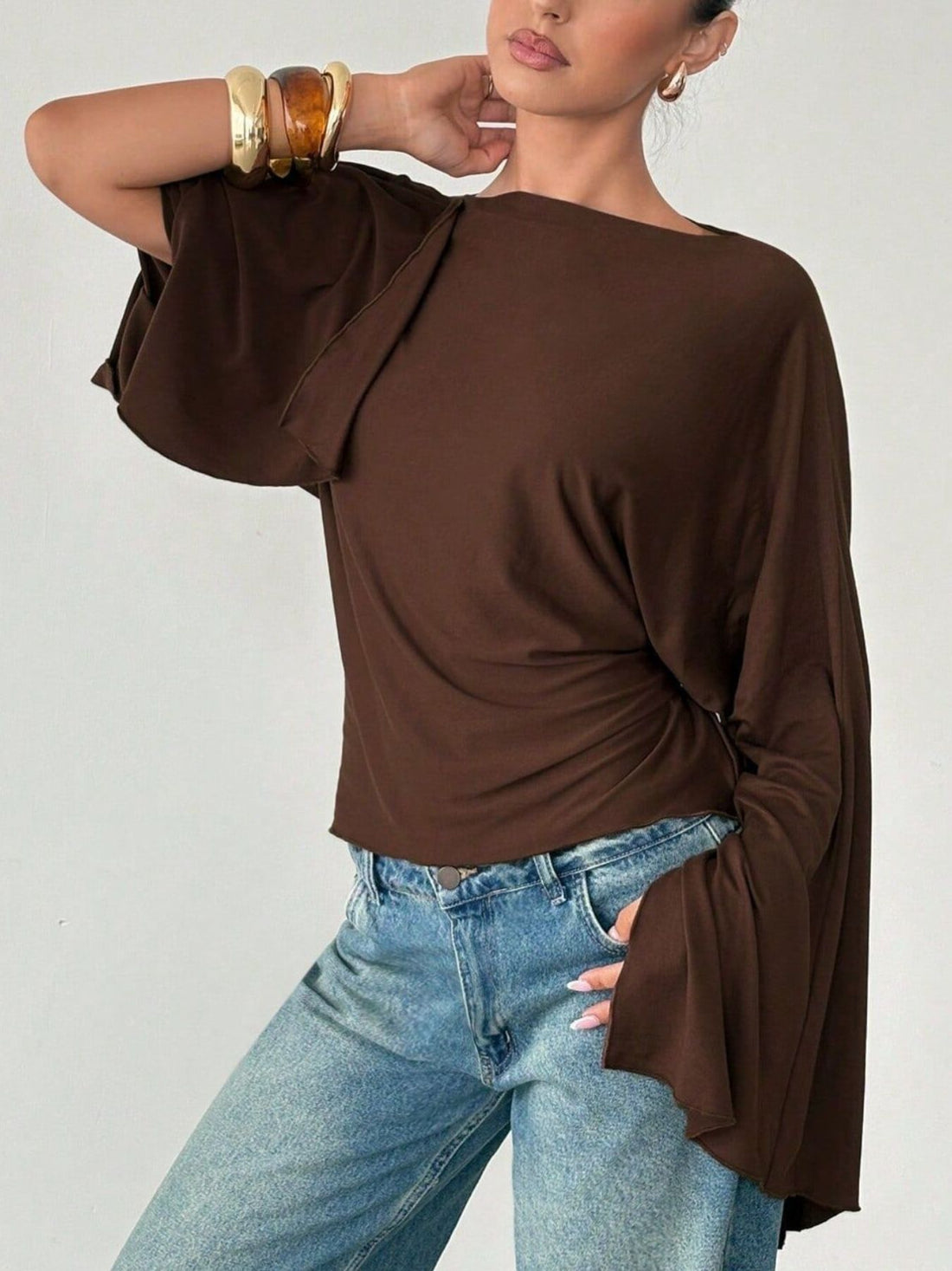top in dark brown featuring ruched and relaxed fit