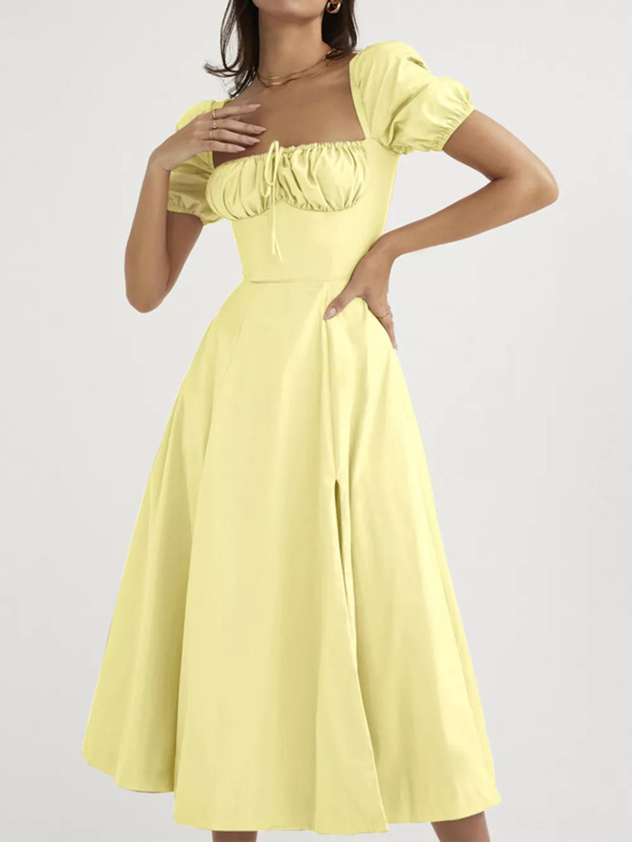 Pastel yellow puff sleeve tie front midi dress with a square neckline and thigh slit.