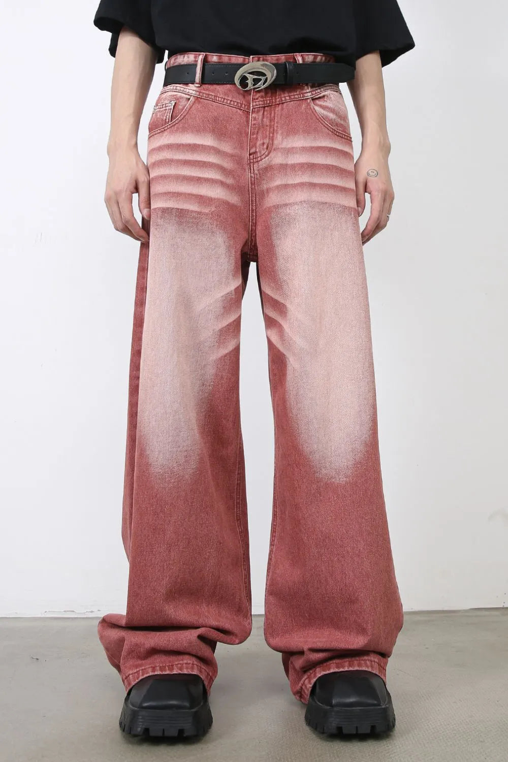 Dip-dye wide-leg denim trousers in rust with a faded wash and relaxed fit.