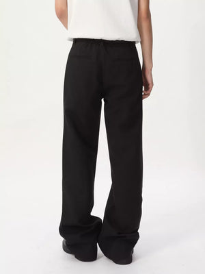 Black wide-leg sweatpants with adjustable drawstring waist and two back pockets.