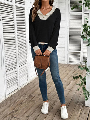 Chic ribbed two-tone maternity shirt in black and beige with button detail.