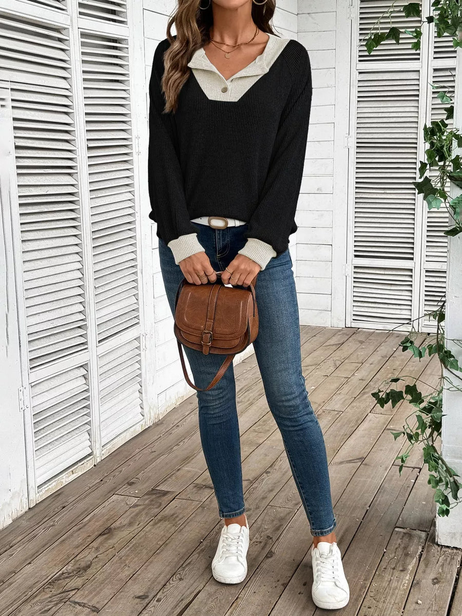 Chic ribbed two-tone maternity shirt in black and beige with button detail.