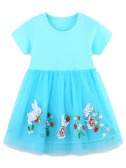 Blue tulle dress with bunny and strawberry embroidery, short sleeves, round neck.