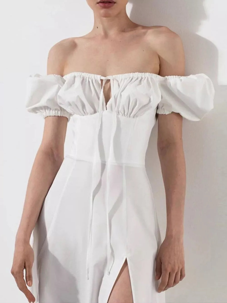 White puff sleeve tie front midi dress with off-the-shoulder neckline and thigh slit.