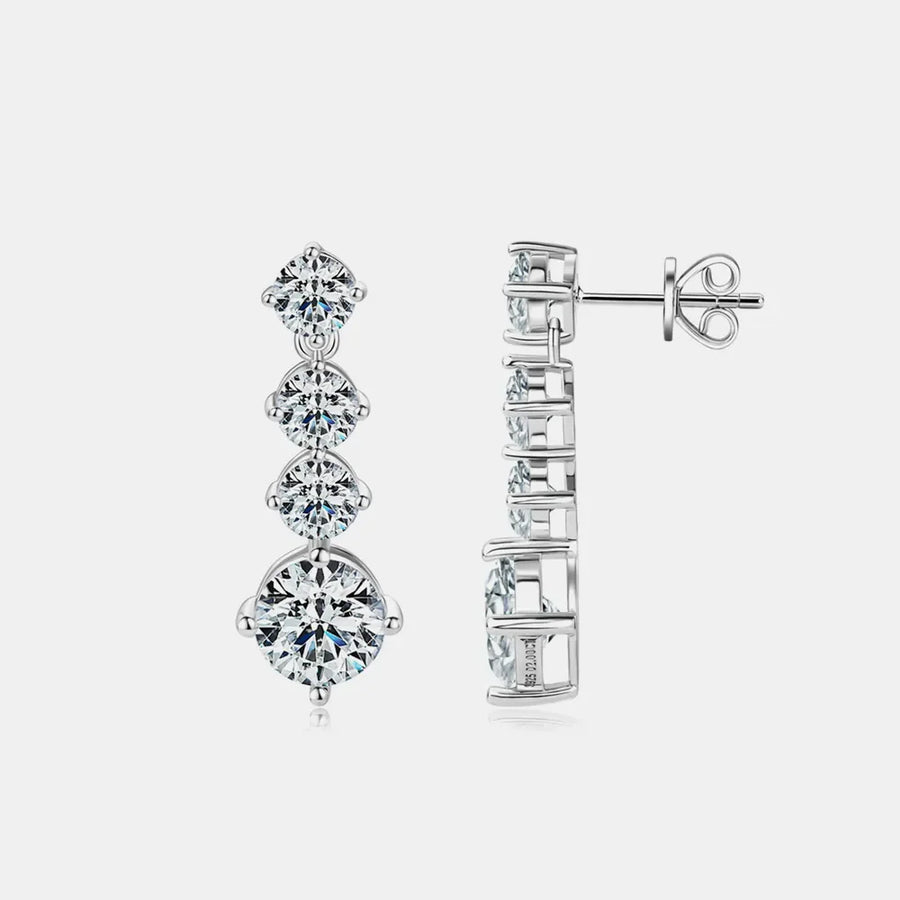 Silver cascade cubic zirconia drop earrings with four round-cut stones.