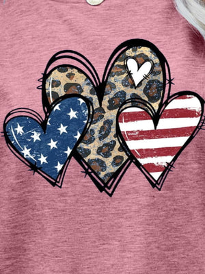 Dusty Pink t-shirt with three hearts: one leopard print, one American flag, and one red striped flag.